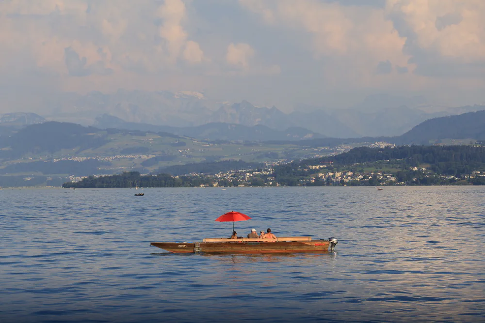 Red Umbrella on the Lake