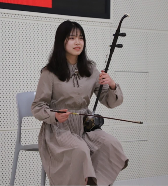 Playing erhu
